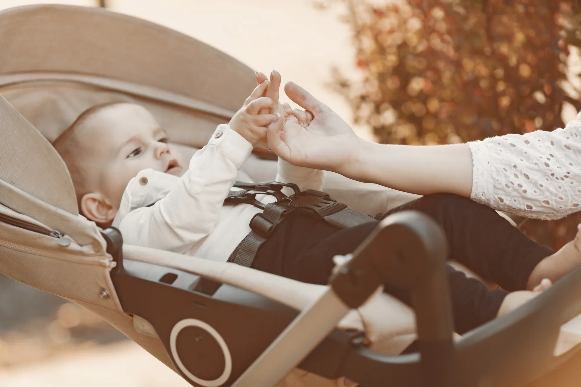 Baby in a stroller holding their mother's hand, things to do with a baby on Istanbul's Asian Side